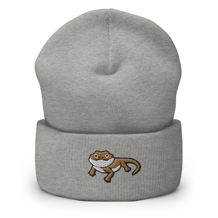 a gray beanie with a cartoon cat on it