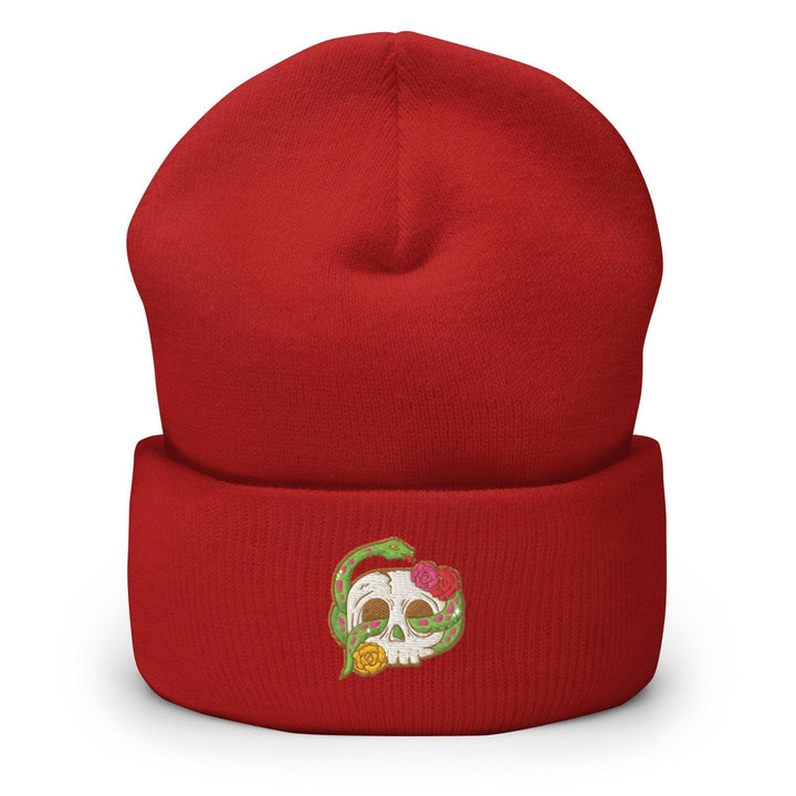 a red beanie with a skull on it