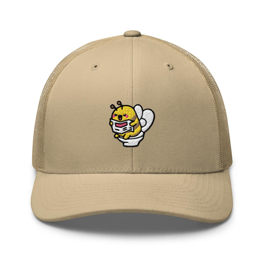a tan hat with a cartoon character on it