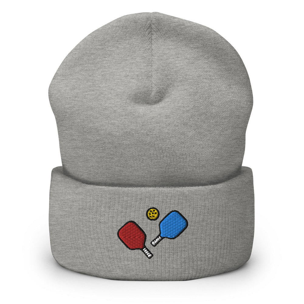 a gray beanie with two ping pong paddles on it