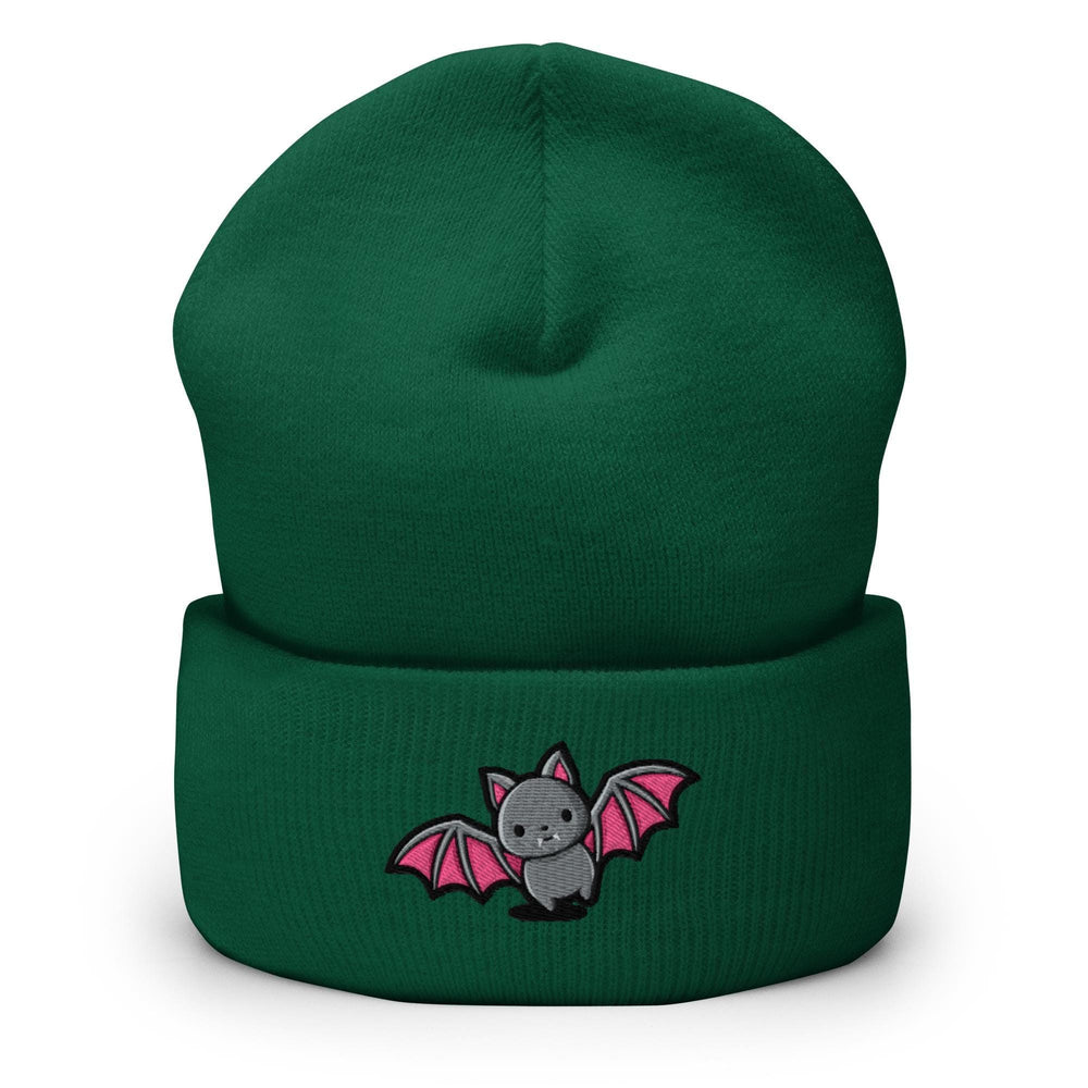 a green beanie with a bat embroidered on it