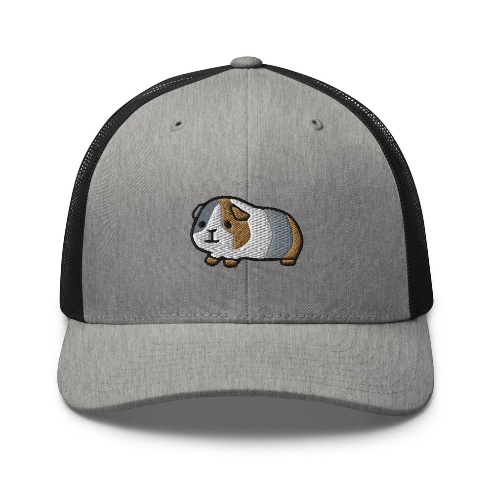 a gray and black cap with a brown and white dog on it
