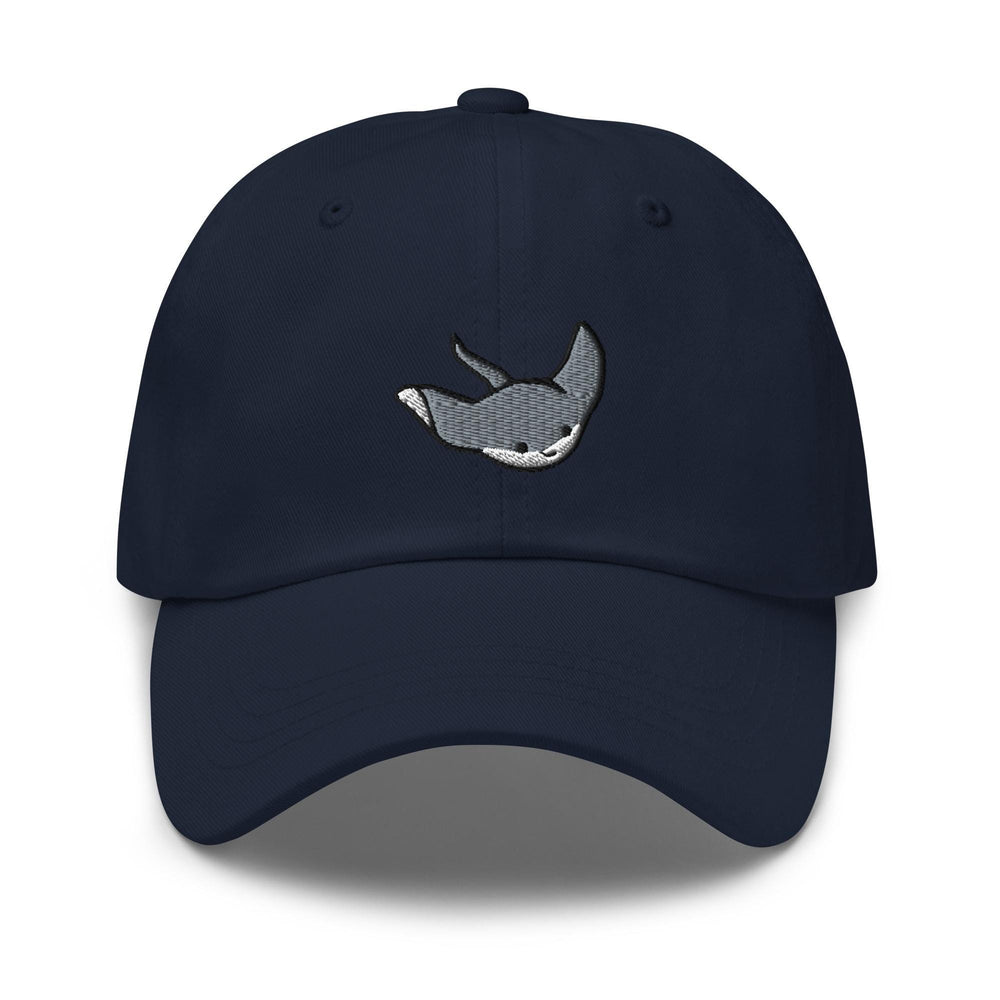 a navy hat with a whale embroidered on the front