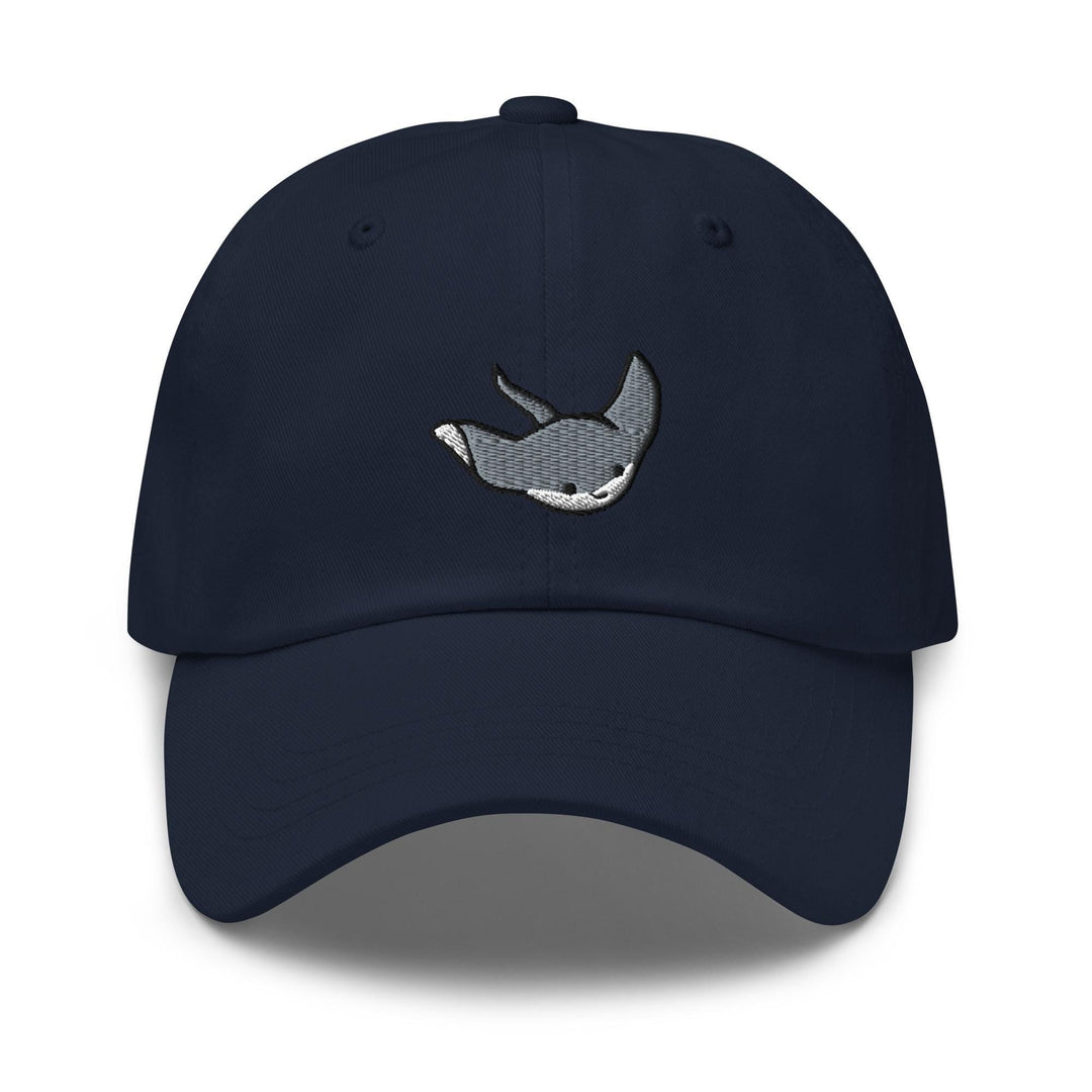 a navy hat with a whale embroidered on the front