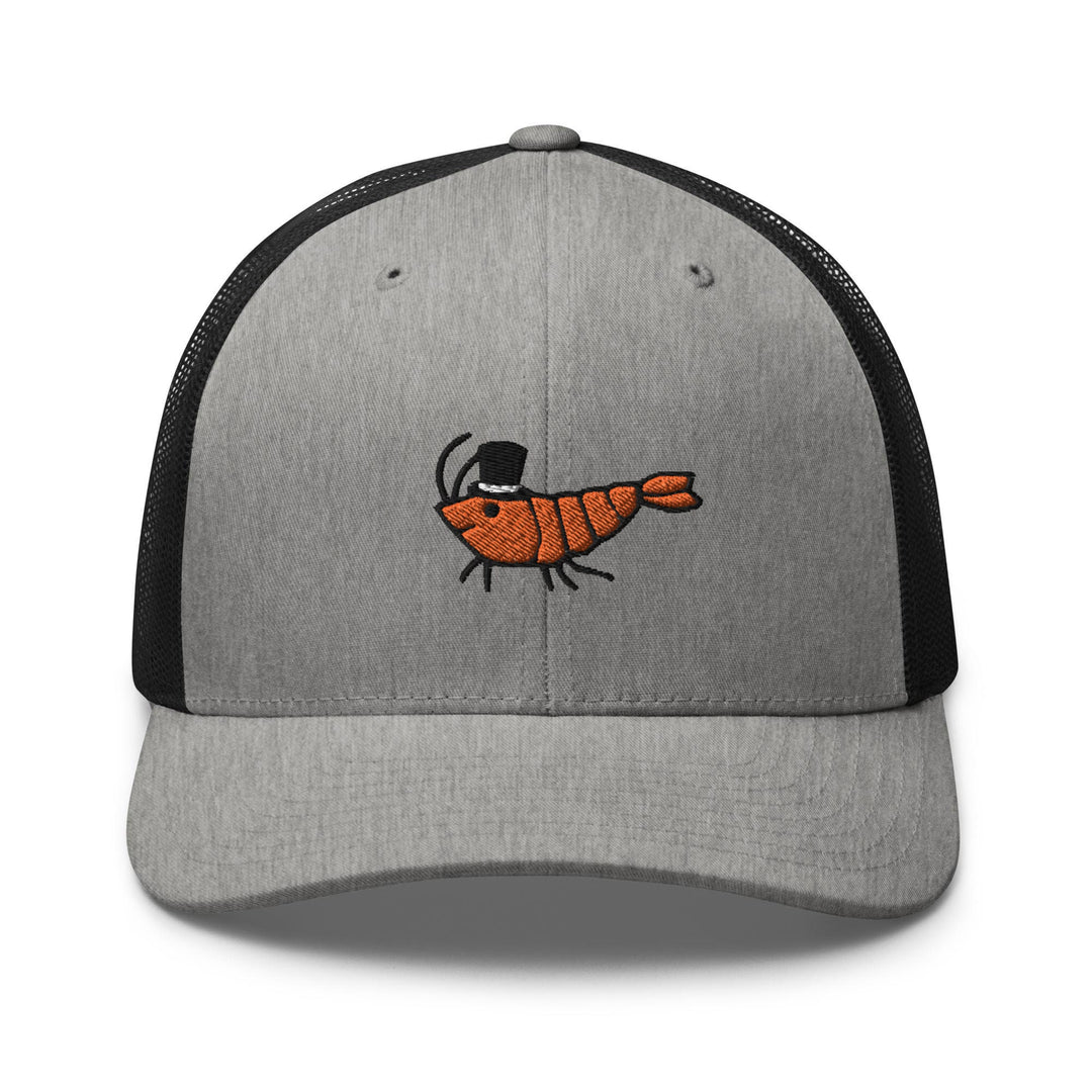 a gray and black hat with a picture of a shrimp on it