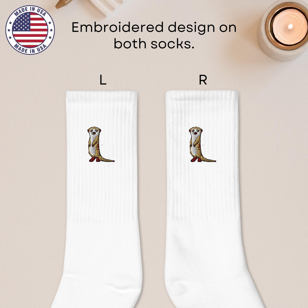 a pair of white socks with an image of a beaver