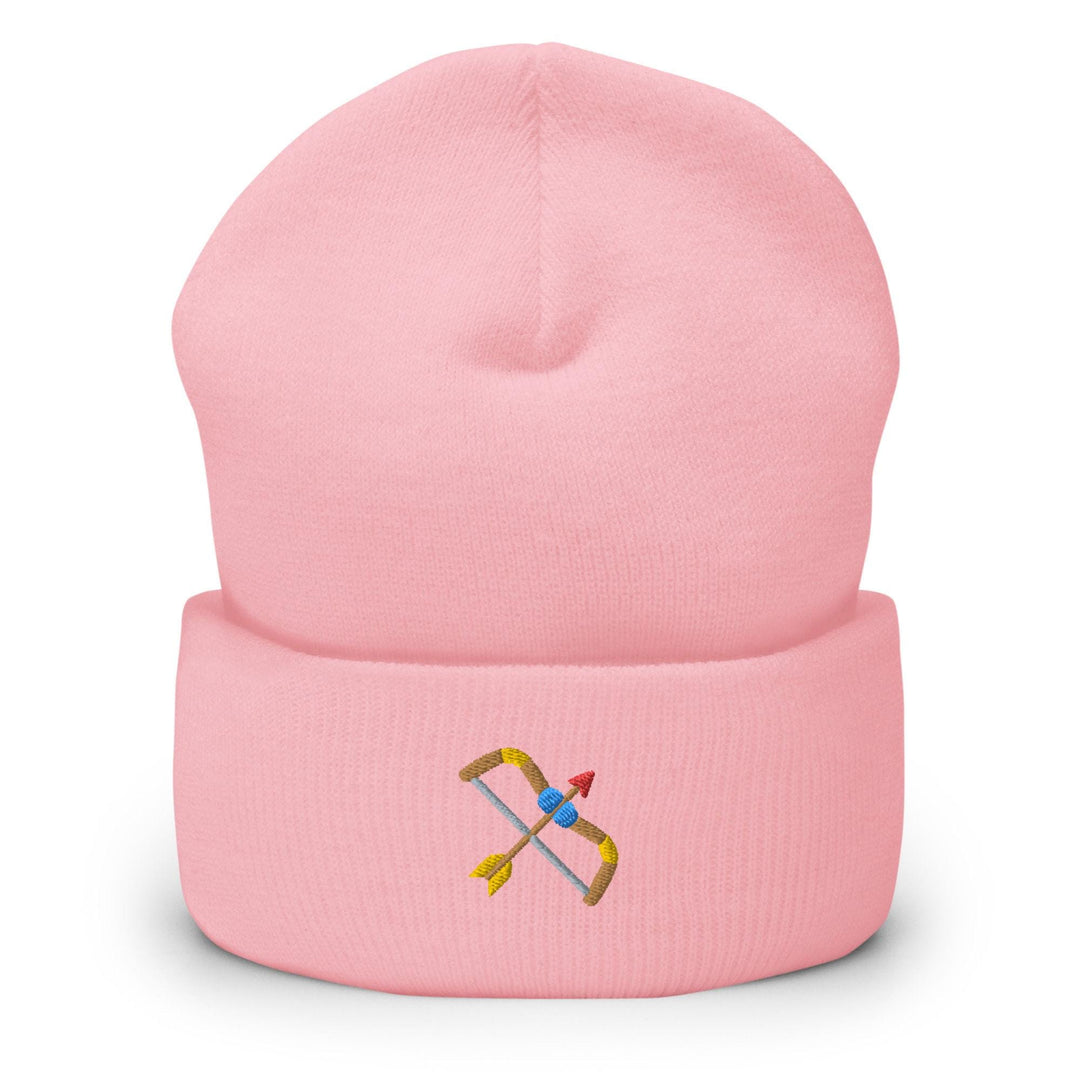 a pink hat with a picture of a pair of skis on it
