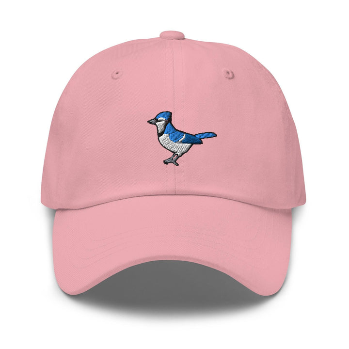 a pink hat with a blue bird embroidered on it