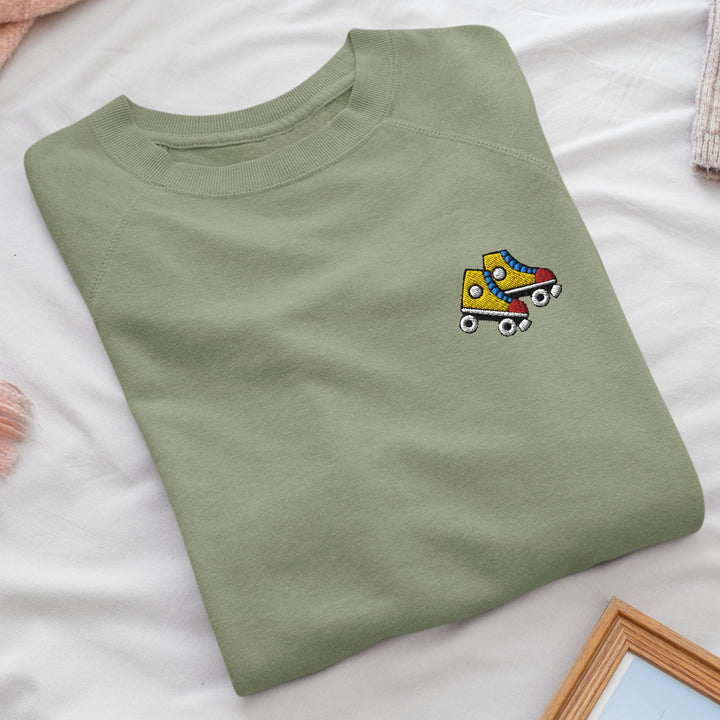 a green t - shirt with a cartoon truck on it