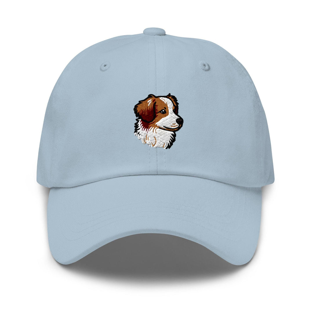 a light blue hat with a picture of a dog on it