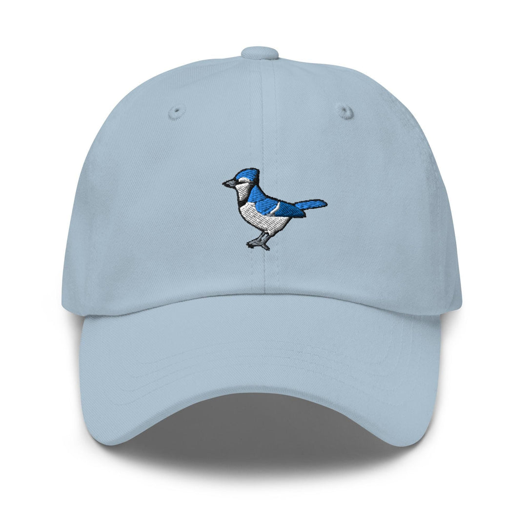 a light blue hat with a blue bird embroidered on it