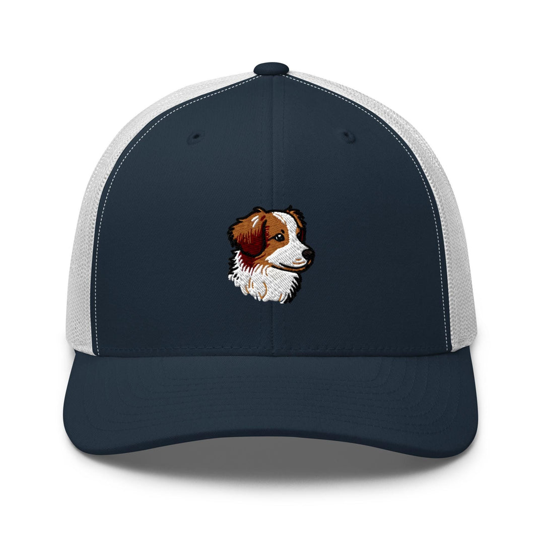 a blue and white trucker hat with a brown and white dog&#39;s face