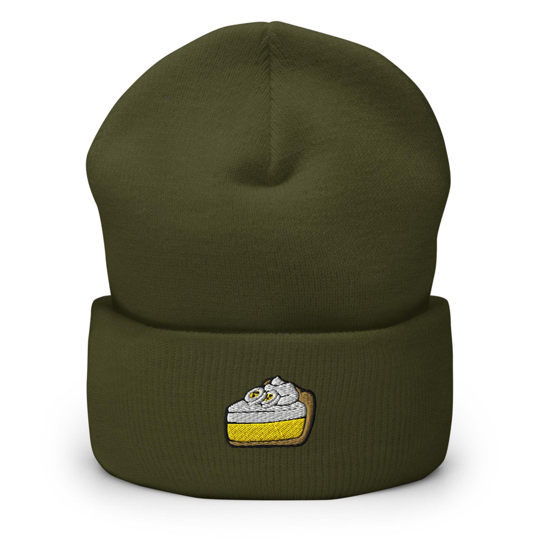 a green beanie with a piece of cake on it