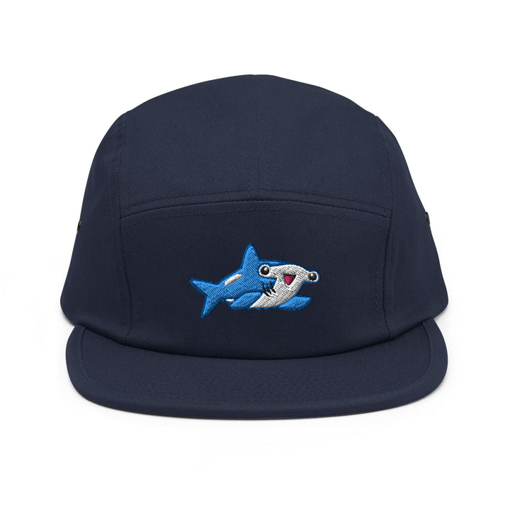 a blue hat with a shark embroidered on it