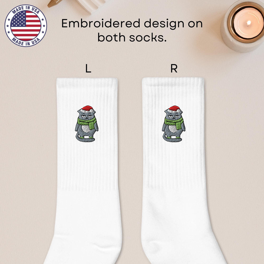 a pair of white socks with a cartoon character on them