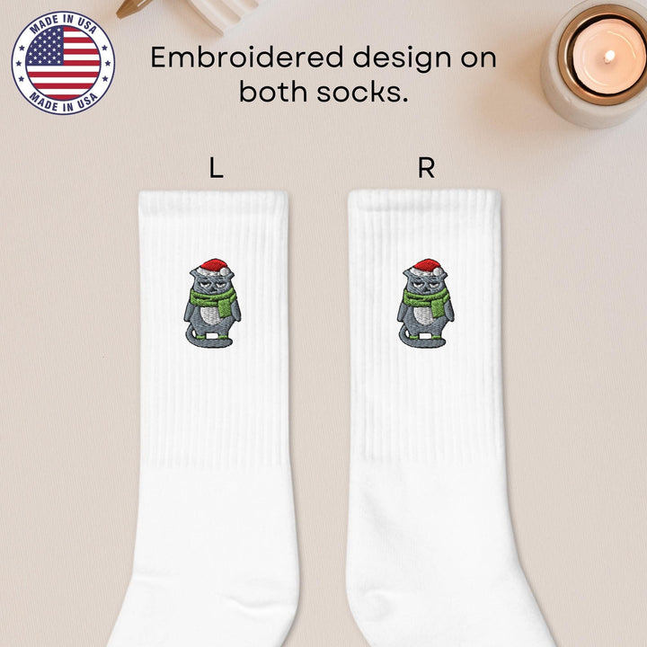 a pair of white socks with a cartoon character on them