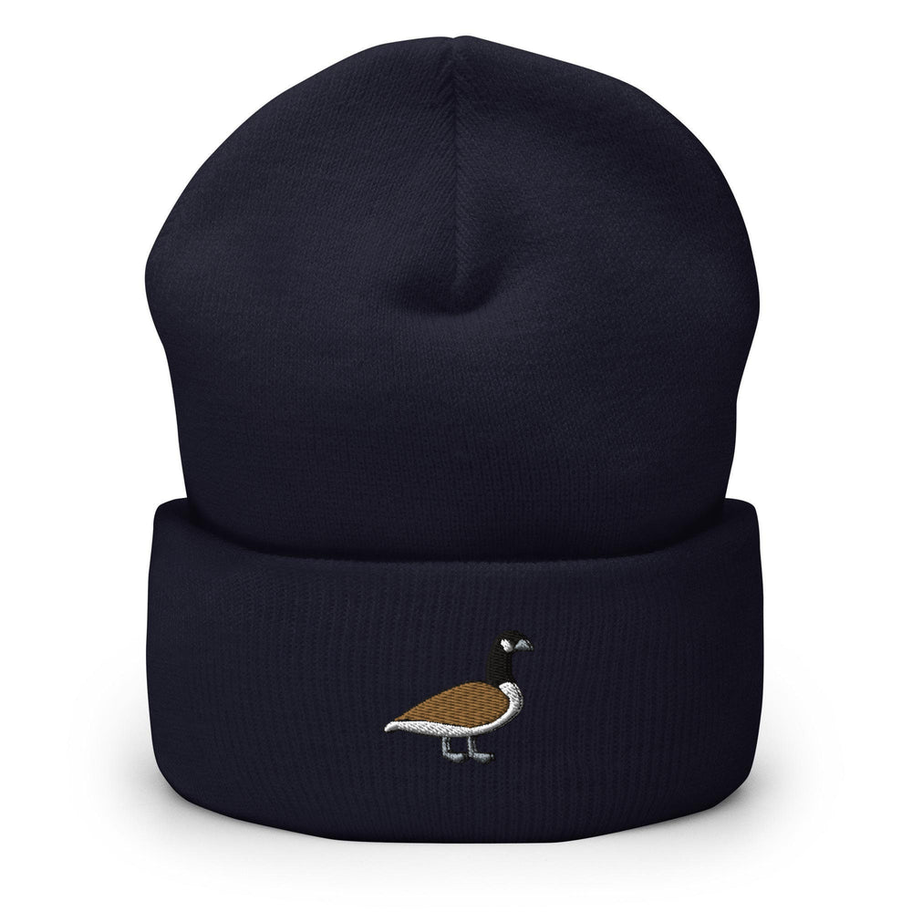 a blue hat with a bird embroidered on it