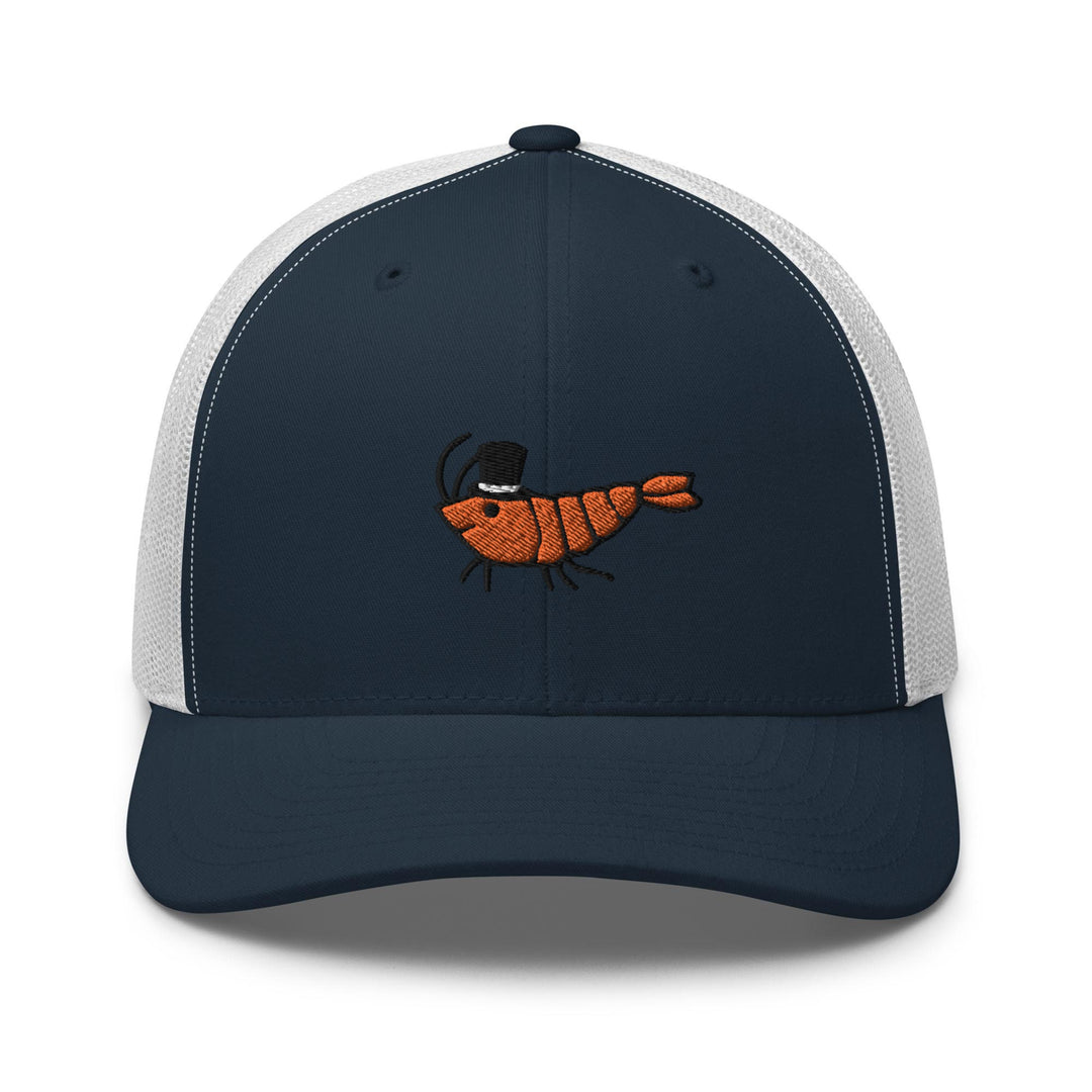 a blue and white trucker hat with an orange fish embroidered on the front