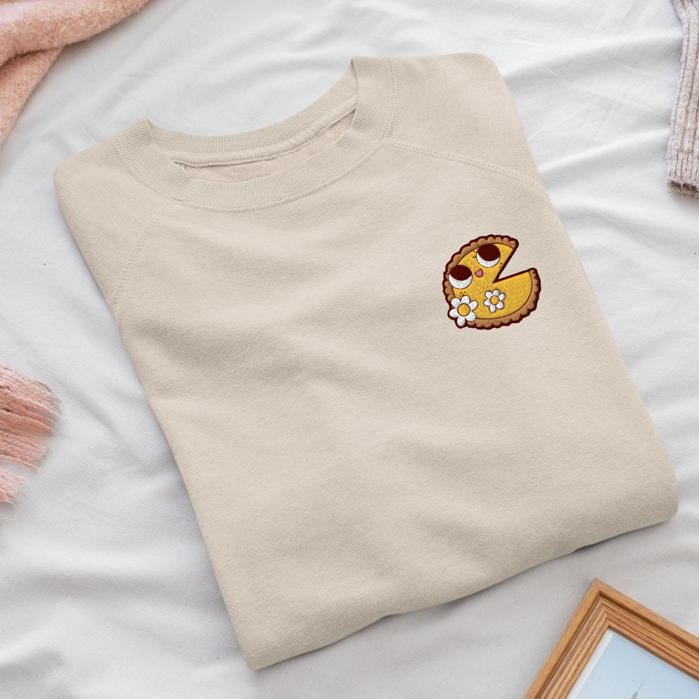 a t - shirt with a picture of a smiley face on it
