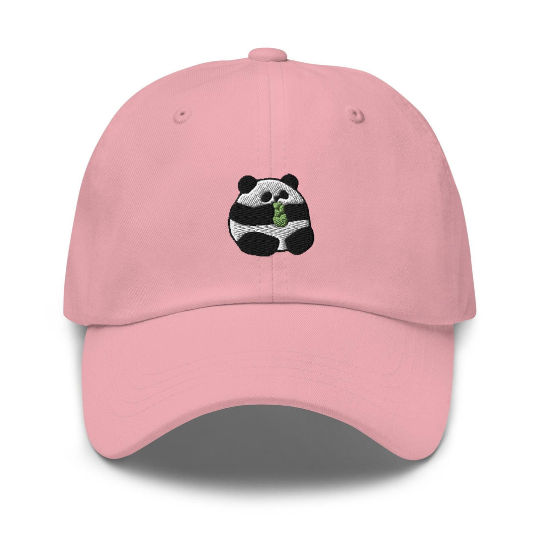 a pink hat with a panda eating a leaf