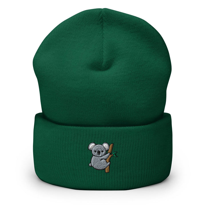 a green hat with a koala holding a baseball bat