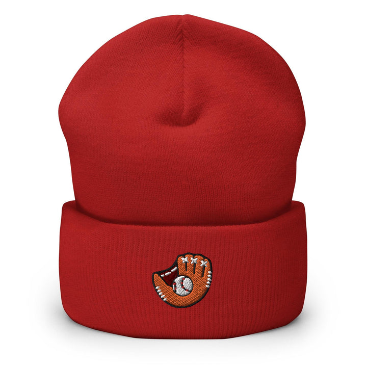 a red beanie with a baseball on it