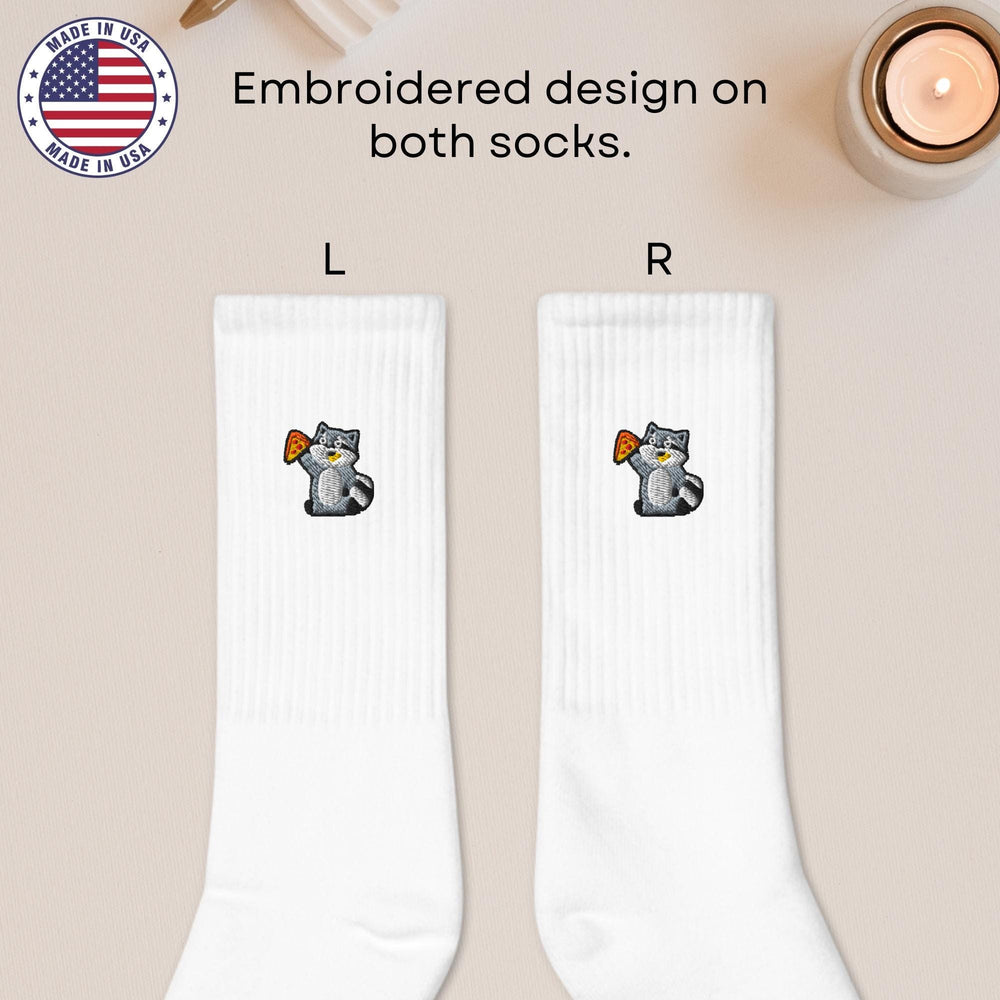 a pair of socks with a picture of a cat on it
