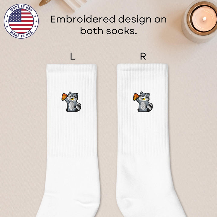 a pair of socks with a picture of a cat on it