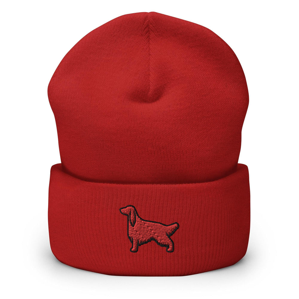 a red hat with a black poodle embroidered on it