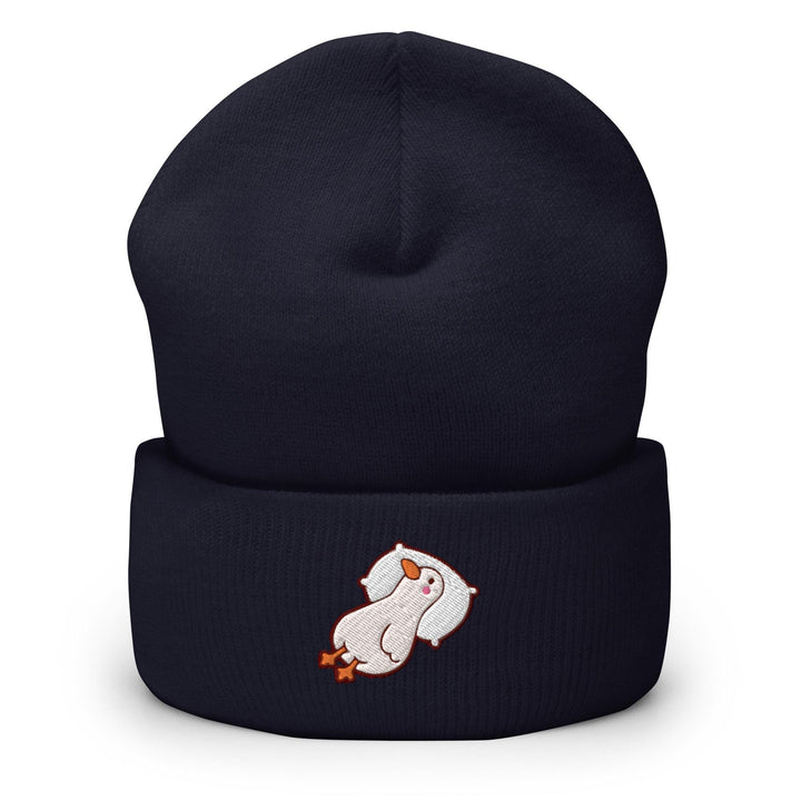 a black beanie with a white bear on it