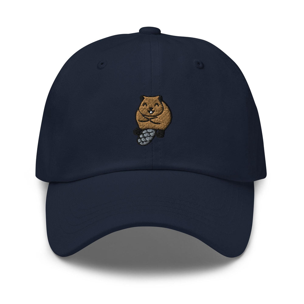 a baseball cap with a bear holding a pine cone