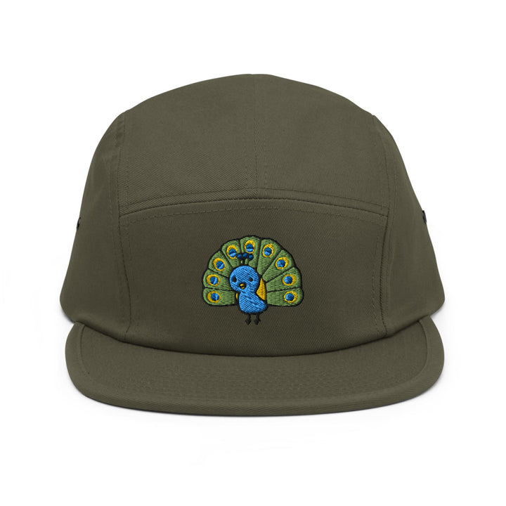 a green hat with a picture of a peacock on it