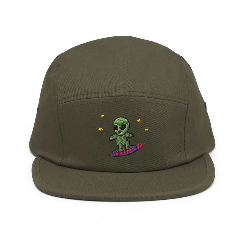 a green hat with an alien on it