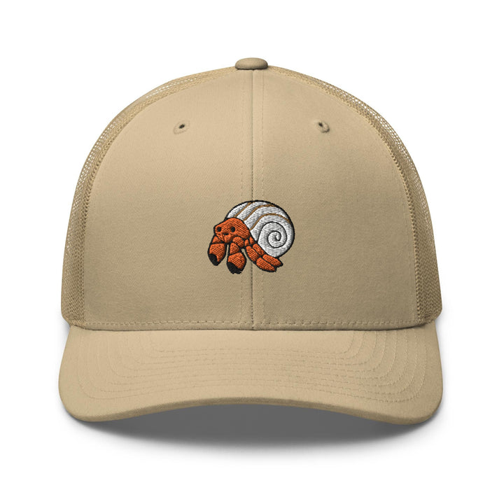 a tan trucker hat with an orange fish embroidered on the front
