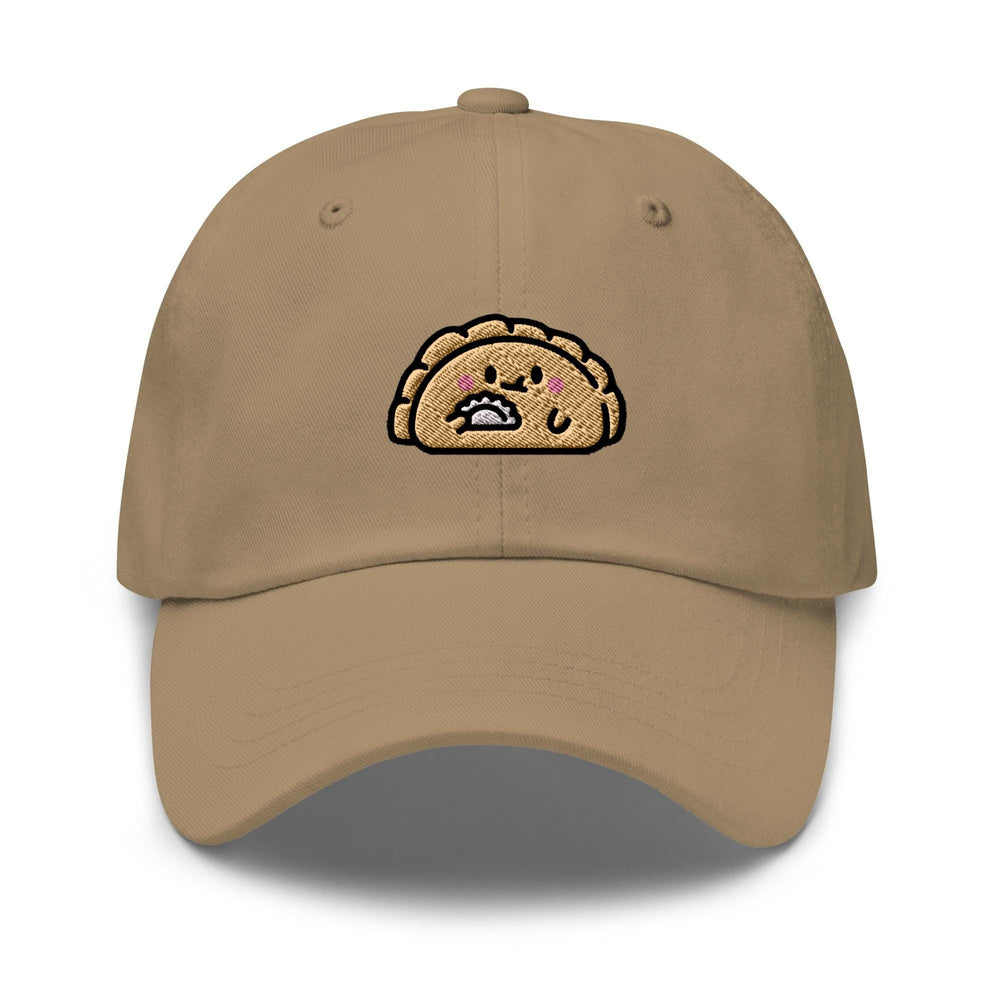 a tan hat with a cartoon turkey on it