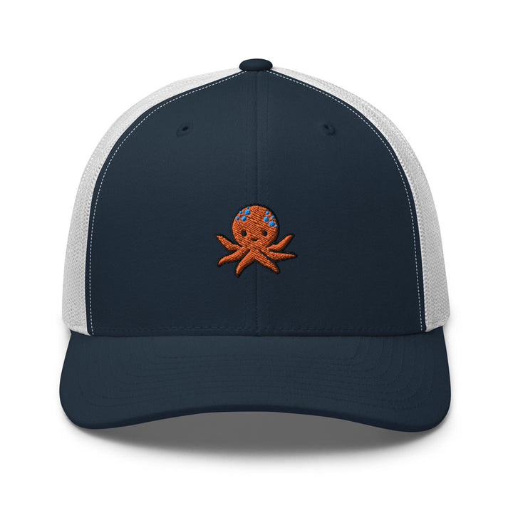 a blue and white trucker hat with an octopus embroidered on the front