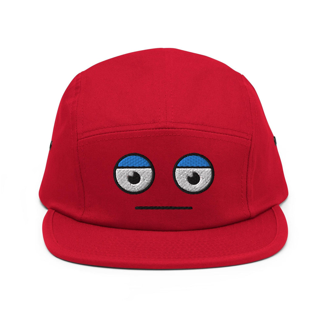 a red hat with eyes on it