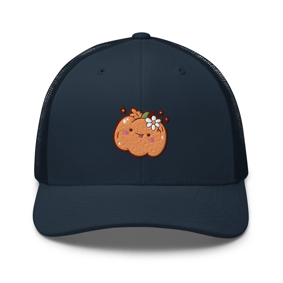 a blue trucker hat with a pumpkin embroidered on the front