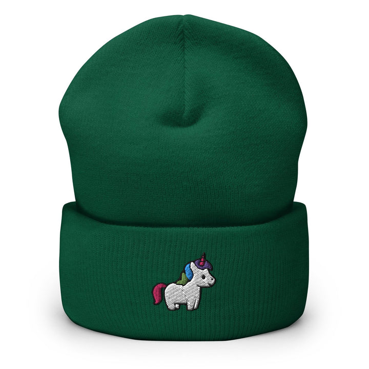 a green beanie with a unicorn embroidered on it