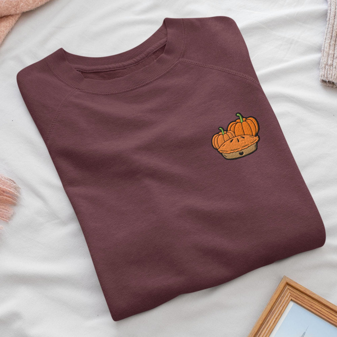 a t - shirt with a picture of a pumpkin on it