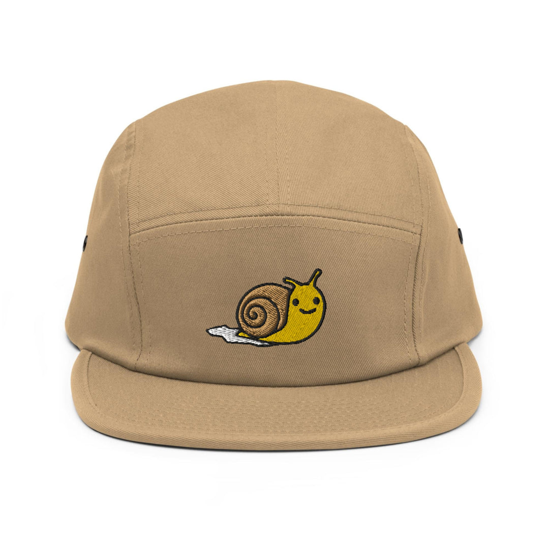 a brown hat with a snail on it