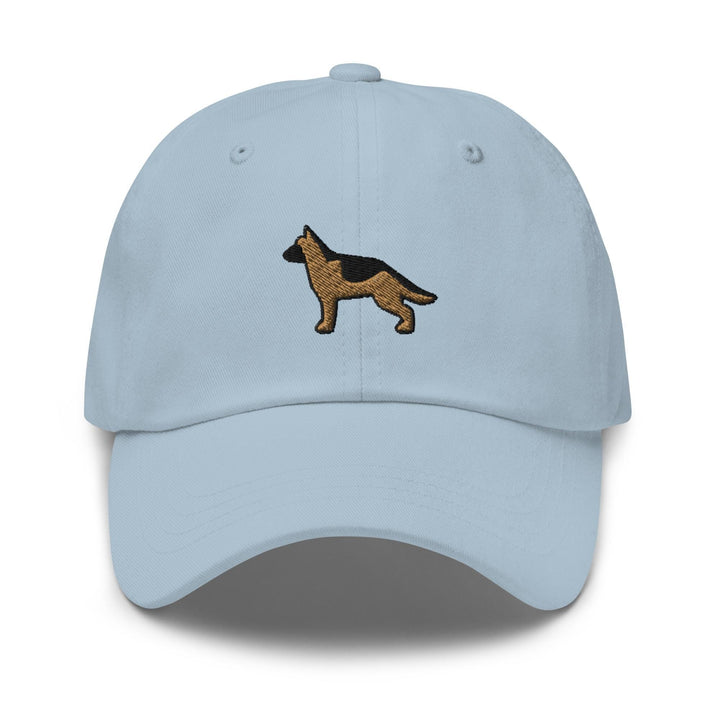 a light blue hat with a dog embroidered on it