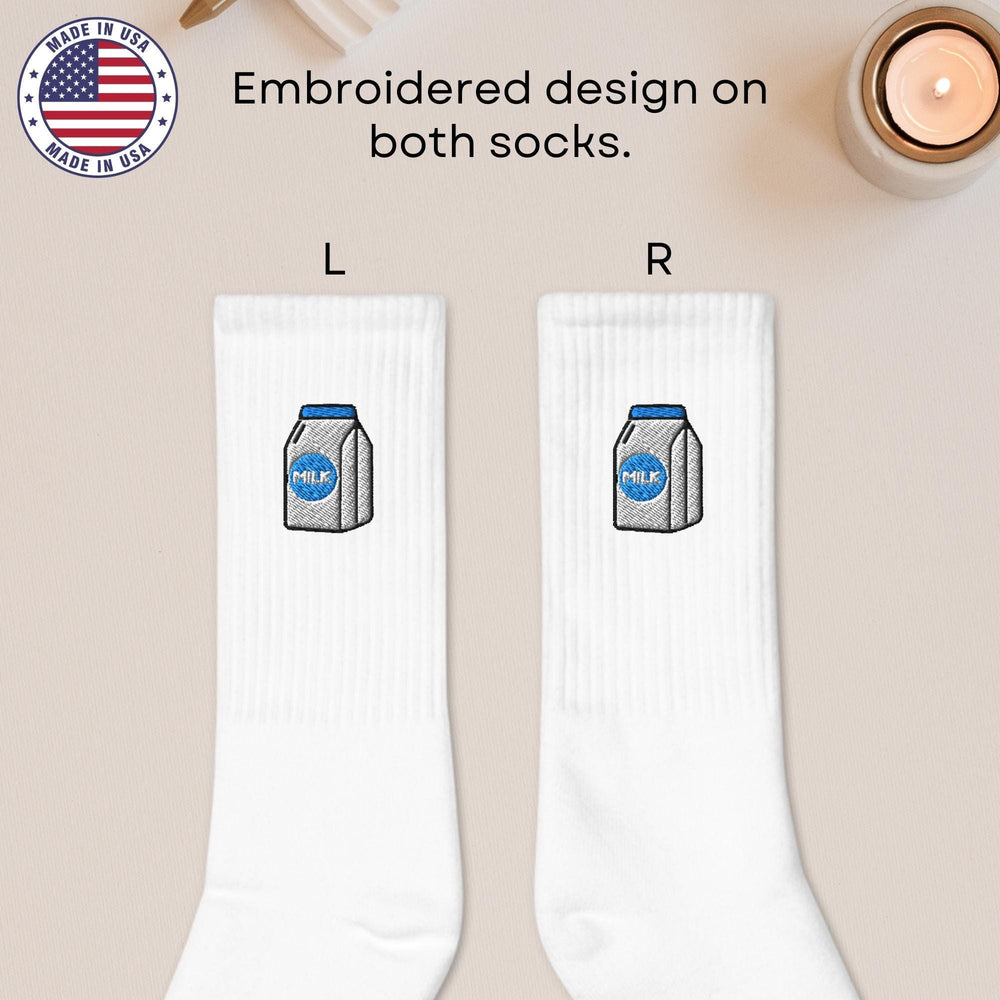 a pair of white socks with a picture of a milk carton